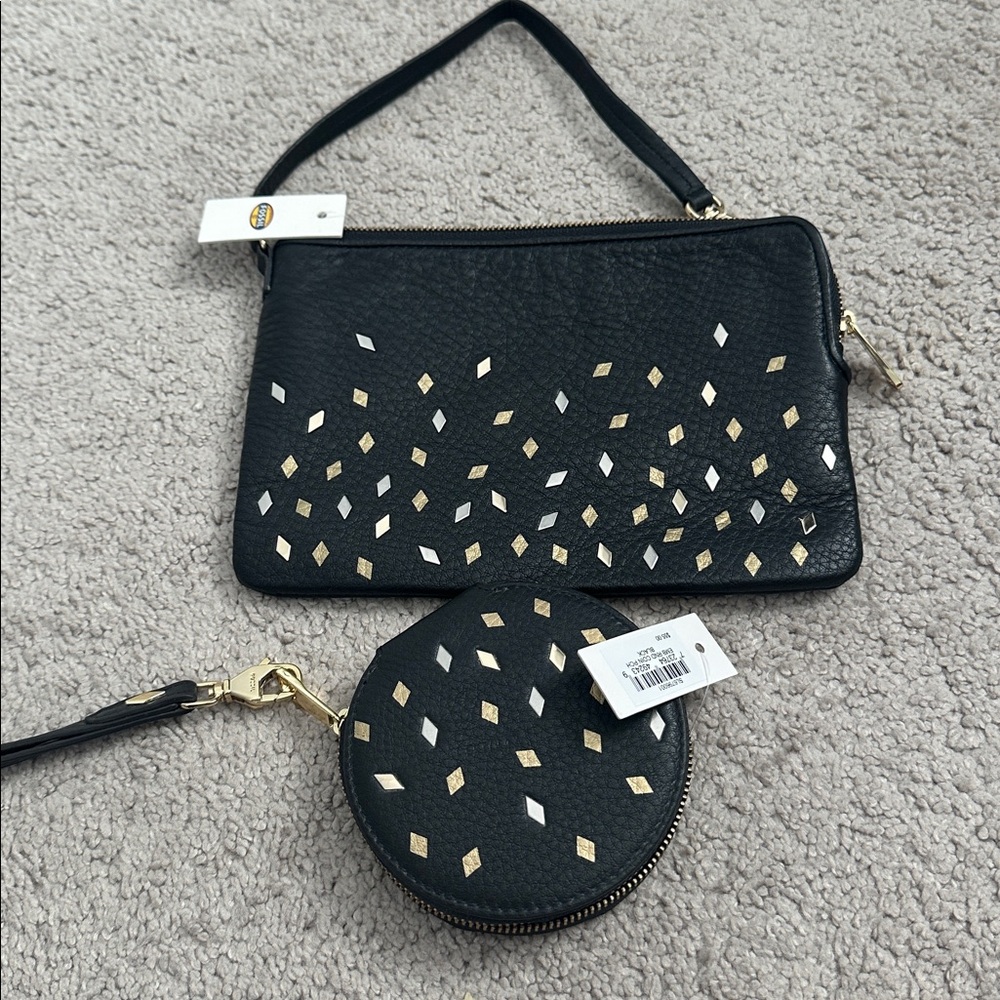 - NWT , Fossil , wallet wristlet WITH coin purse. 
Leather